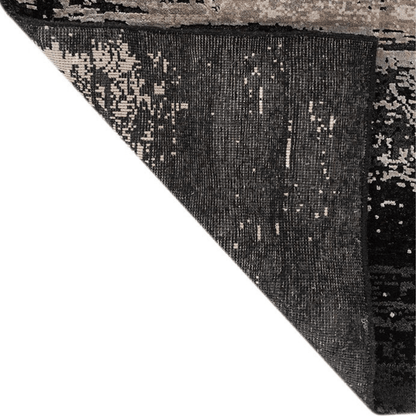 Tapis Drift noir et gris | Laine et soie de luxe, noué à la main