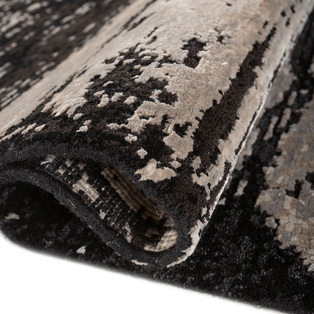 Tapis Drift noir et gris | Laine et soie de luxe, noué à la main