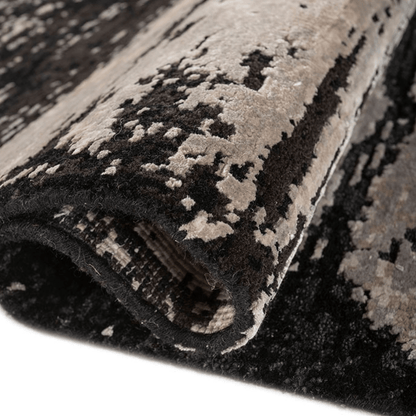 Tapis Drift noir et gris | Laine et soie de luxe, noué à la main