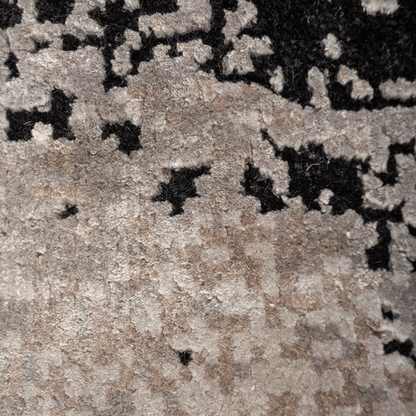 Tapis Drift noir et gris | Laine et soie de luxe, noué à la main